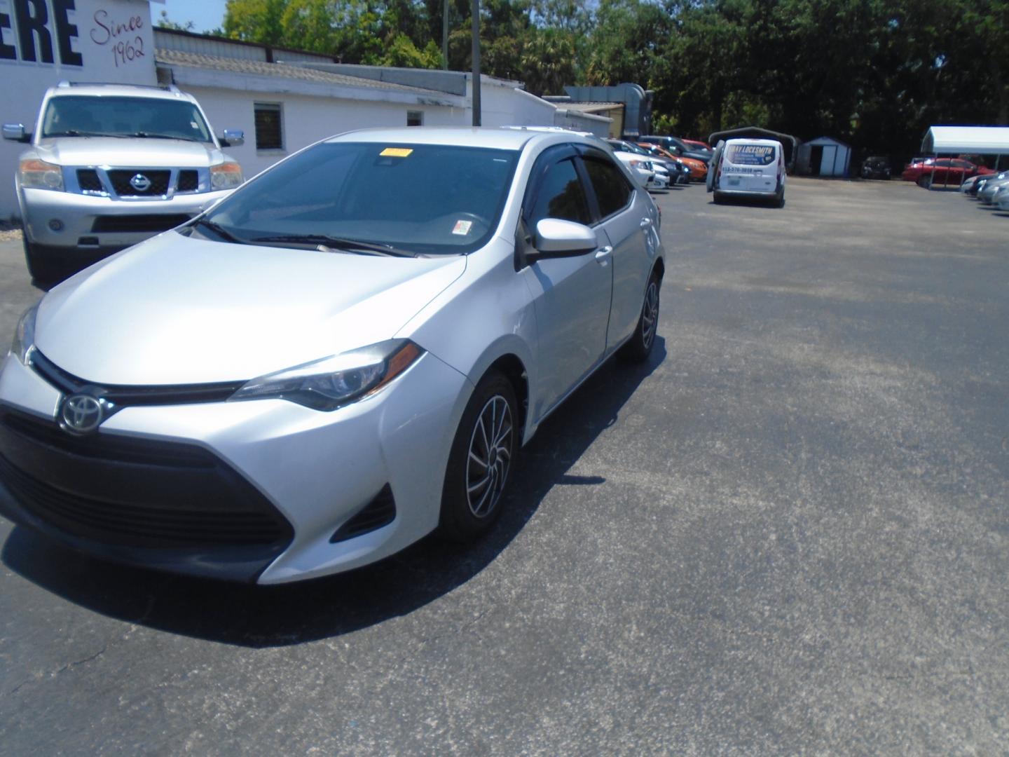 2017 SILVER Toyota Corolla L CVT (2T1BURHE1HC) with an 1.8L L4 DOHC 16V engine, CVT transmission, located at 6112 N Florida Avenue, Tampa, FL, 33604, (888) 521-5131, 27.954929, -82.459534 - Photo#2